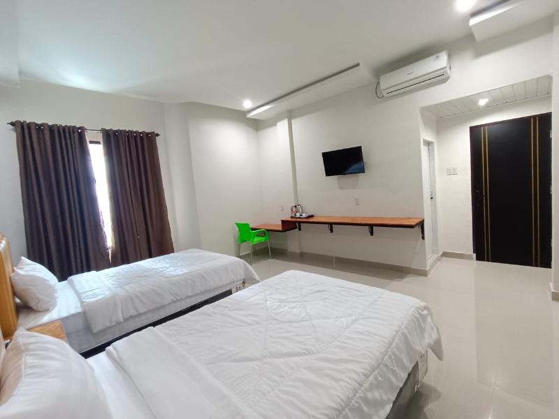 Grand Mulia Hotel Kisaran - Oda