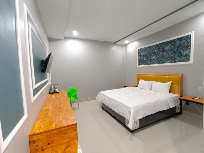 Grand Mulia Hotel Kisaran - Oda