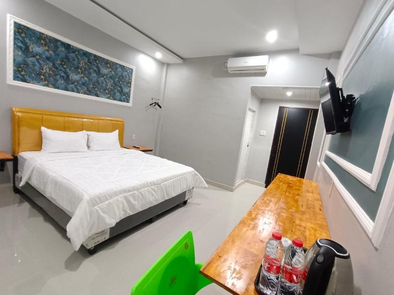 Grand Mulia Hotel Kisaran - Oda