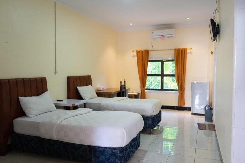Malibou Hotel Medan By Zuzu - Oda