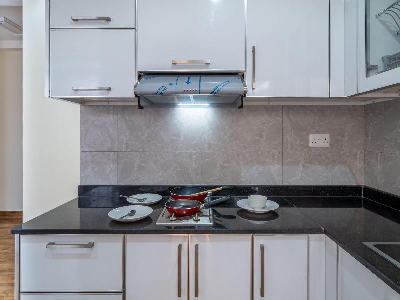 Oyo Townhouse 156 Rose Hotel Apartments - Oda