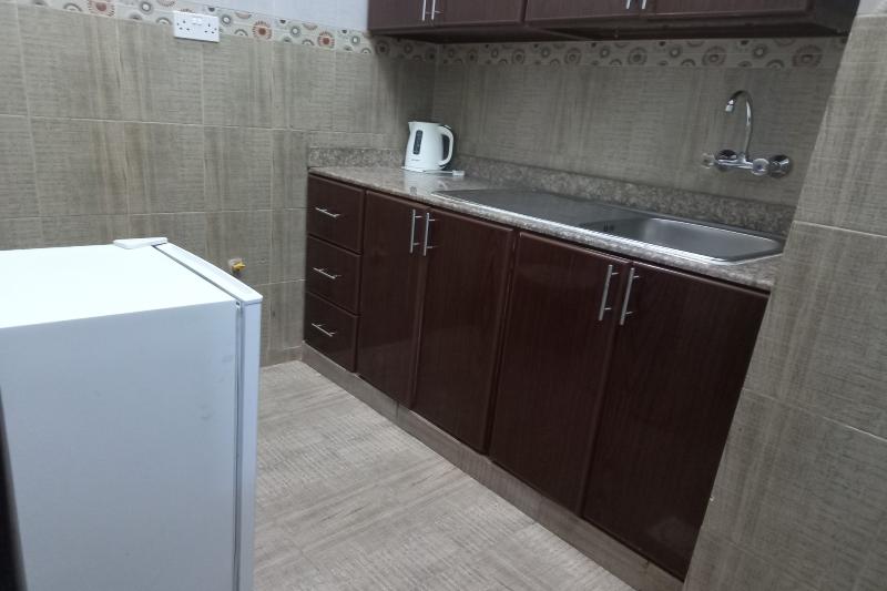 Super Oyo 147 Babylon Furnished Apartment - Oda