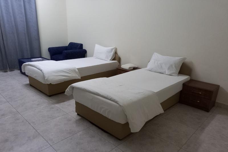 Super Oyo 147 Babylon Furnished Apartment - Oda