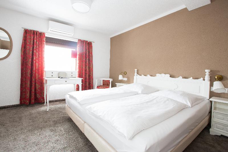 Boutique Hotel Goldhahn - Oda