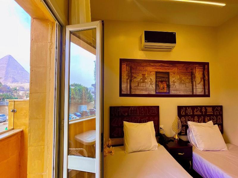 Nemes Pyramids View Inn - Oda