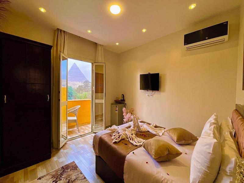 Nemes Pyramids View Inn - Oda
