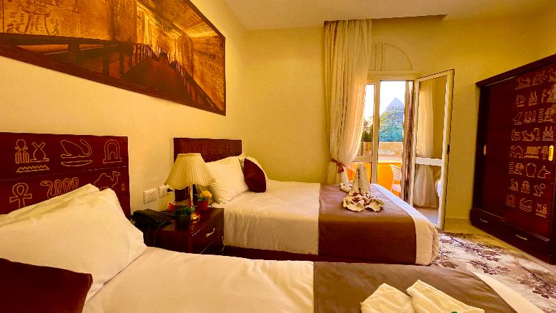 Nemes Pyramids View Inn - Oda