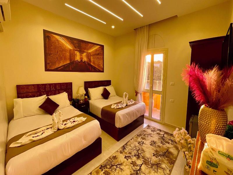 Nemes Pyramids View Inn - Oda