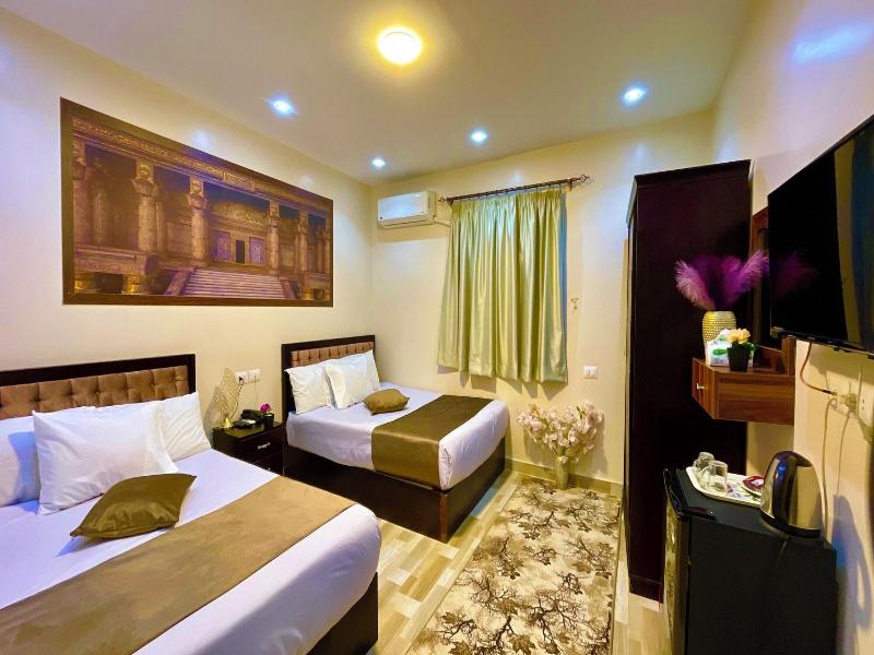 Nemes Pyramids View Inn - Oda