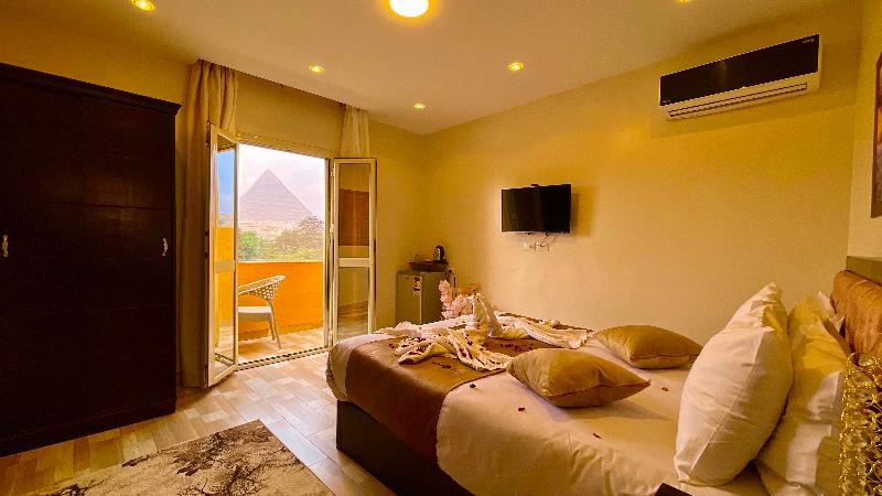 Nemes Pyramids View Inn - Oda
