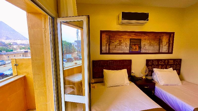 Nemes Pyramids View Inn - Oda