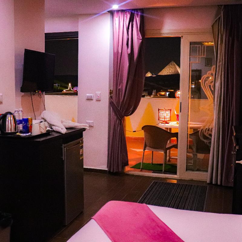Golden Pyramids View Inn - Oda