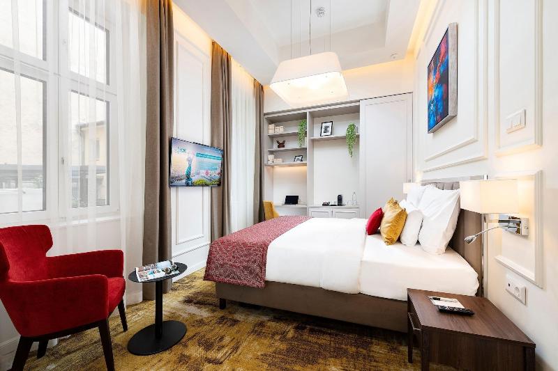 Three Corners Avenue Hotel - Oda