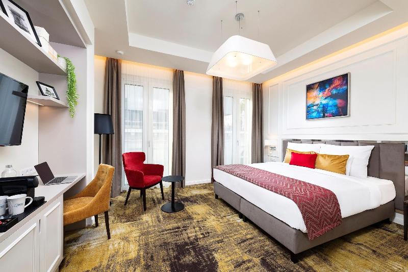 Three Corners Avenue Hotel - Oda