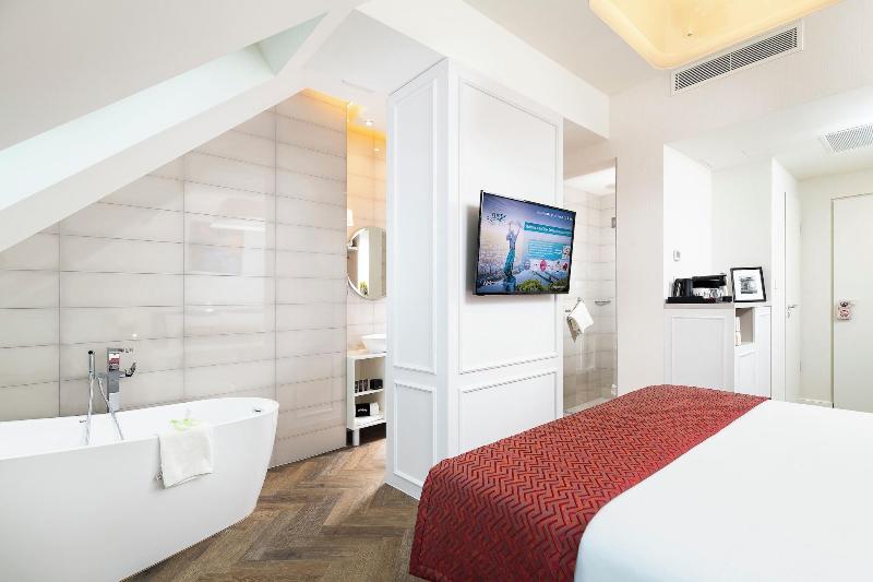 Three Corners Avenue Hotel - Oda