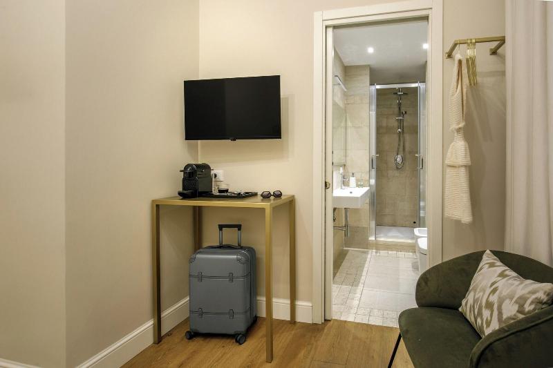 Daplace Santa Susanna Suites - Oda