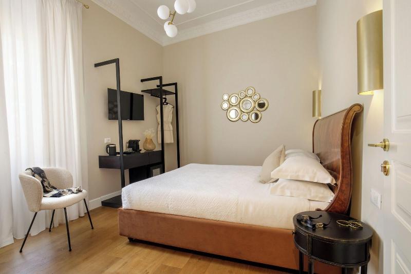 Daplace Santa Susanna Suites - Oda