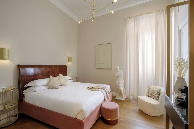 Daplace Santa Susanna Suites - Oda