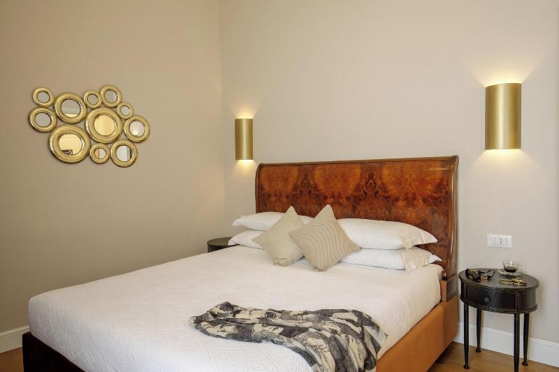 Daplace Santa Susanna Suites - Oda