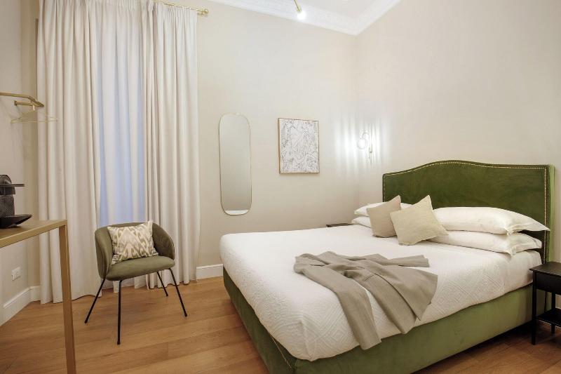 Daplace Santa Susanna Suites - Oda
