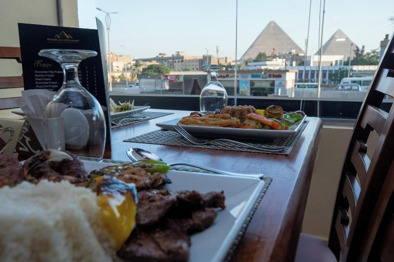 The Muse Pyramids Inn - Restoran