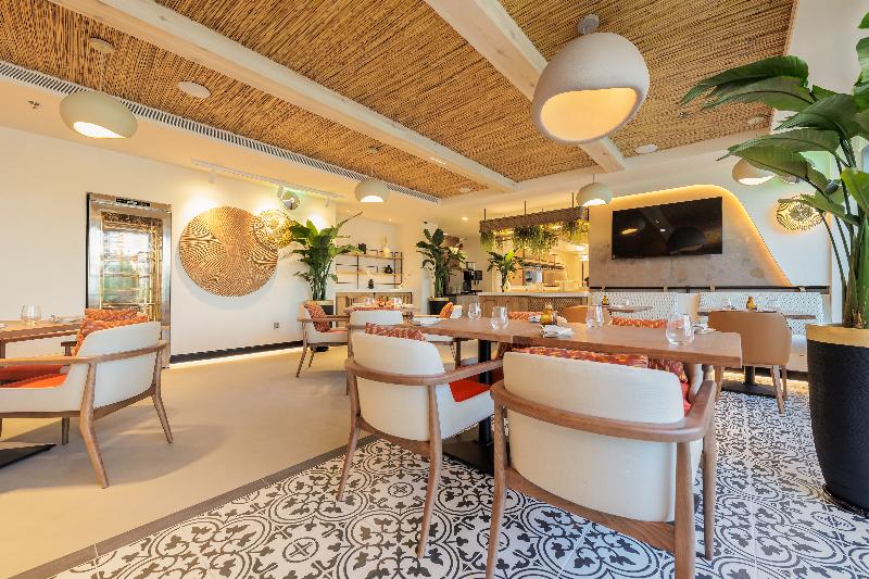 Holiday Inn Dubai Village Circle by IHG - Restoran