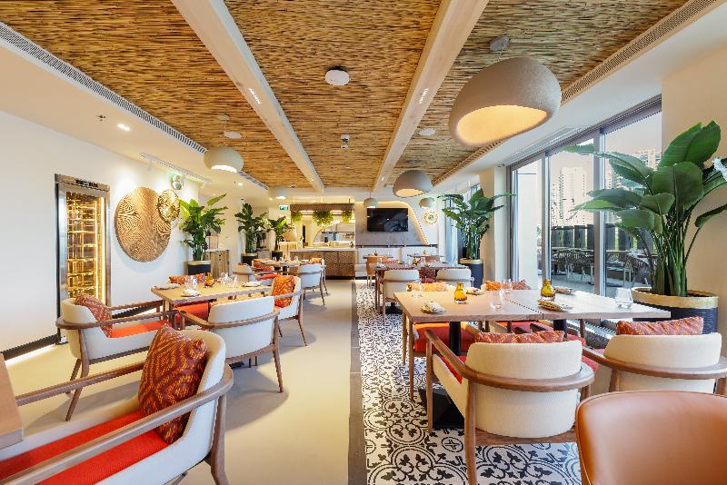 Holiday Inn Dubai Village Circle by IHG - Restoran