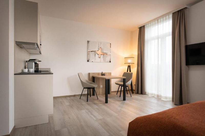 TOP Atrium Apart Hotel Bruehl - Oda