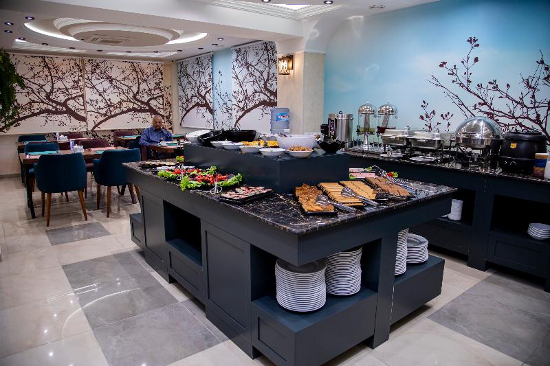Essam Deluxe Hotel - Restoran