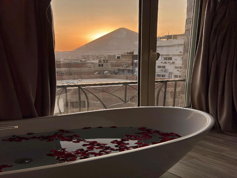 Jimmy Pyramids Hotel - Oda