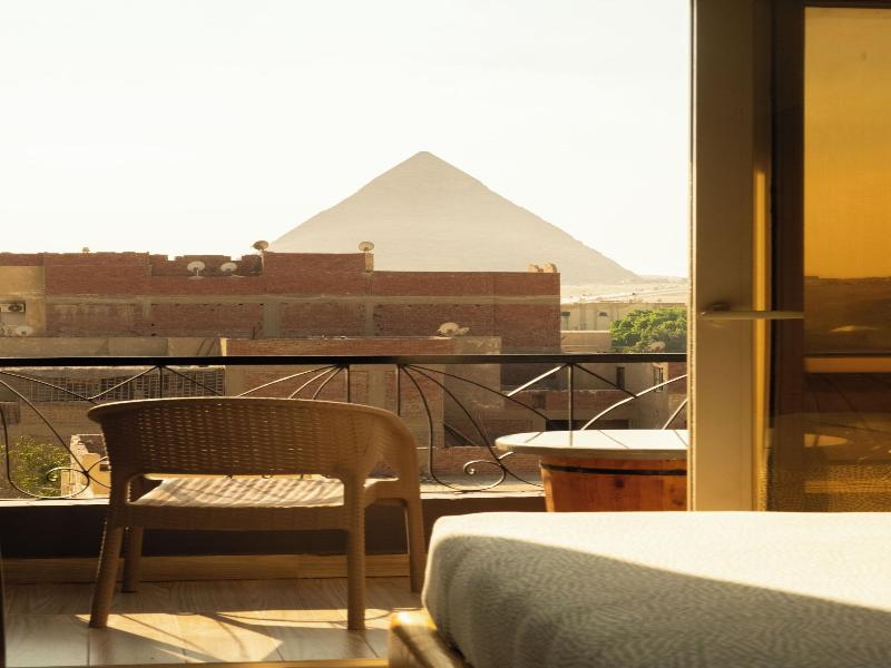 Jimmy Pyramids Hotel - Oda