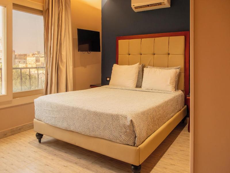 Jimmy Pyramids Hotel - Oda