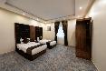 Al Qasr Hotel Suites - Al Iskan District oda fotoğrafı