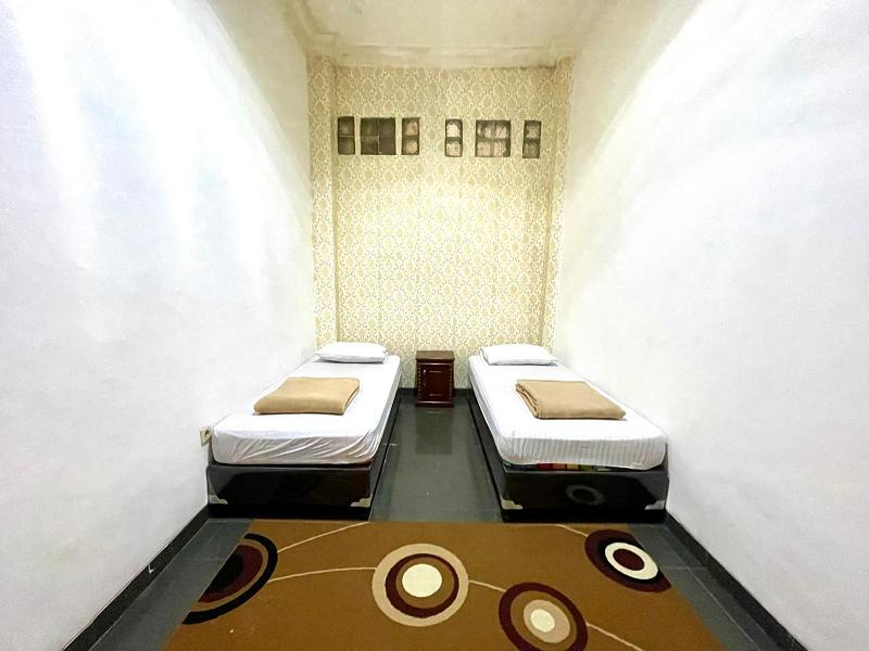 Yani Guesthouse By Zuzu - Oda