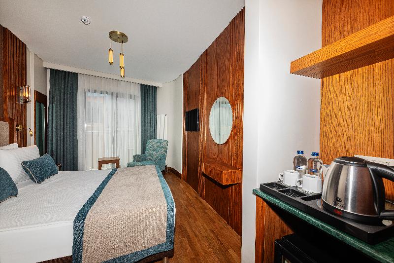 Triton Hotel - Oda