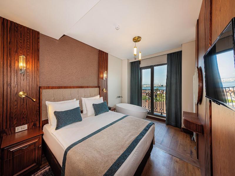 Triton Hotel - Oda