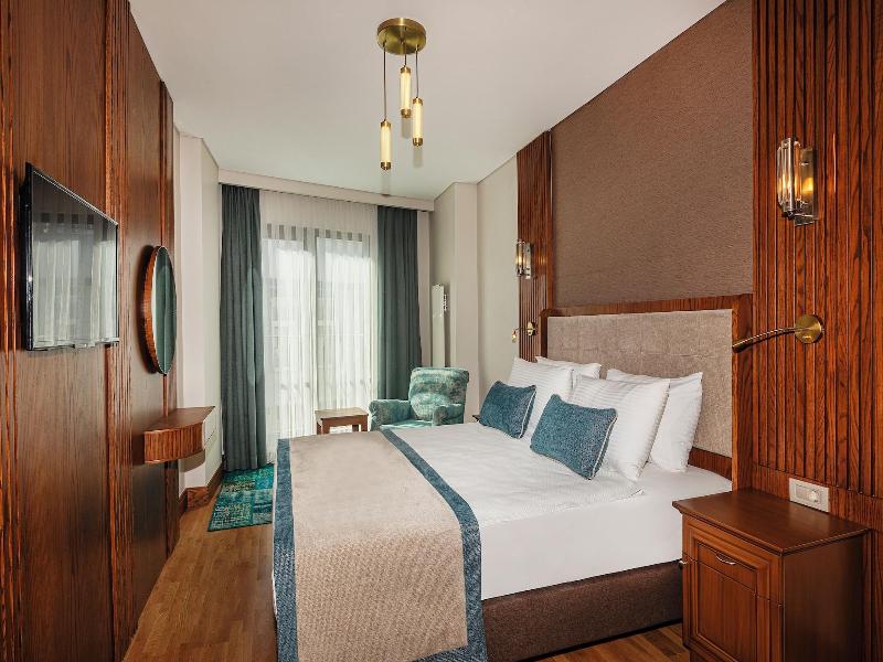 Triton Hotel - Oda