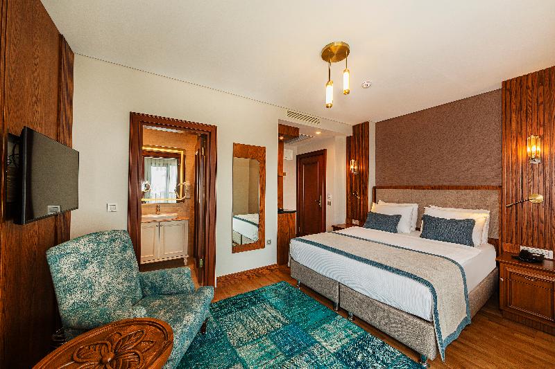 Triton Hotel - Oda