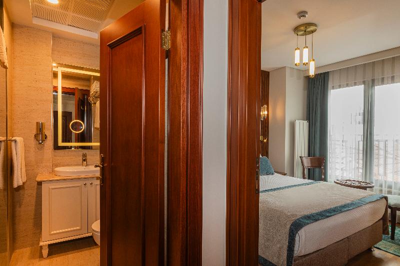 Triton Hotel - Oda