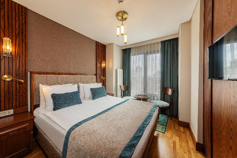Triton Hotel - Oda