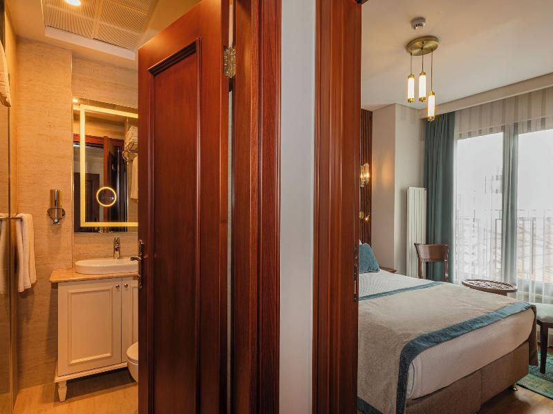 Triton Hotel - Oda
