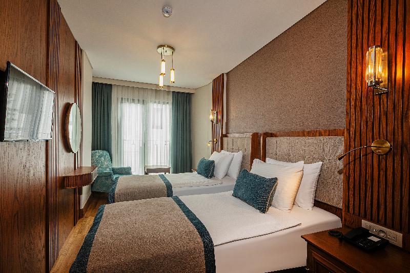 Triton Hotel - Oda