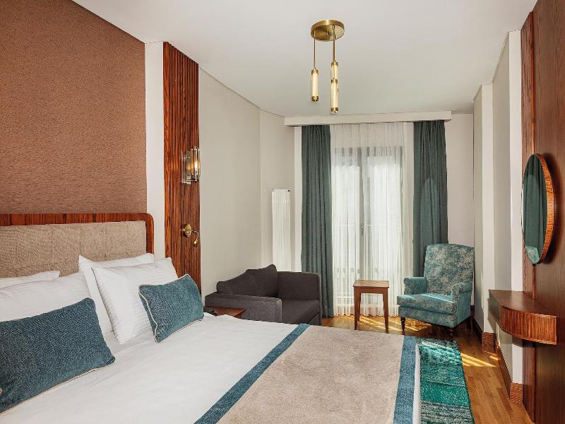 Triton Hotel - Oda