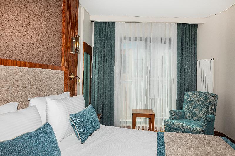 Triton Hotel - Oda