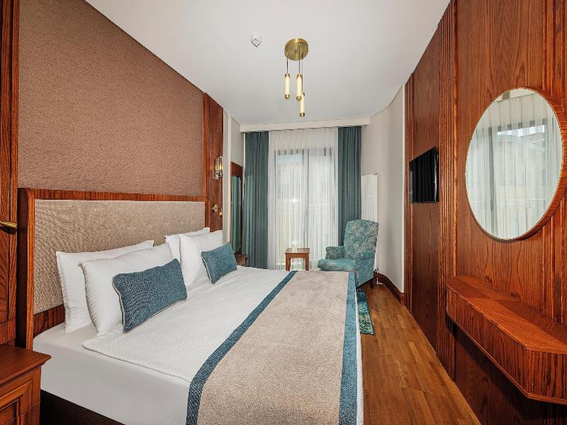 Triton Hotel - Oda