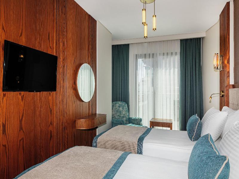 Triton Hotel - Oda