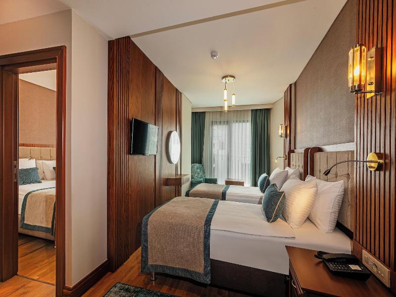 Triton Hotel - Oda
