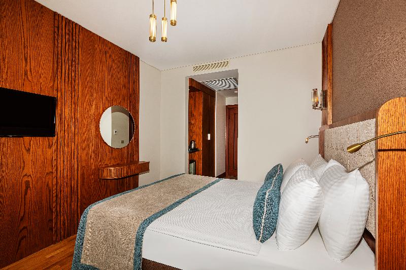 Triton Hotel - Oda