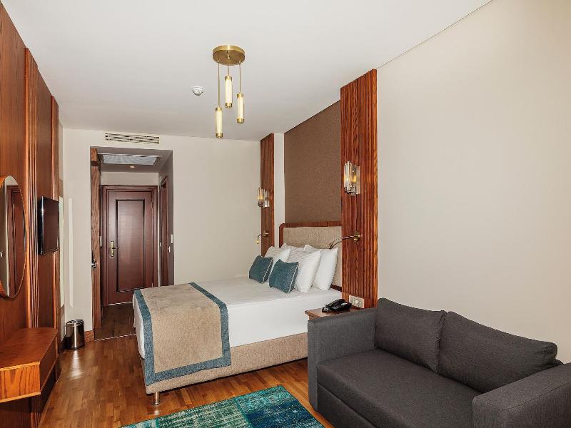 Triton Hotel - Oda