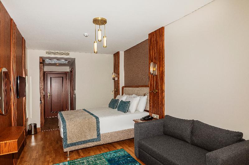 Triton Hotel - Oda